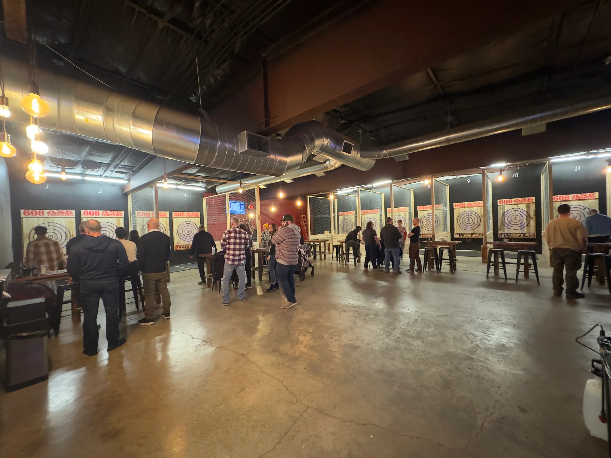 Guests enjoying the axe throwing lanes at 608 Axe Throwing